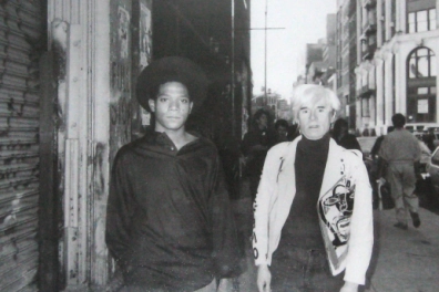 Andy Warhol walking in New York with Jean-Michel Basquiat