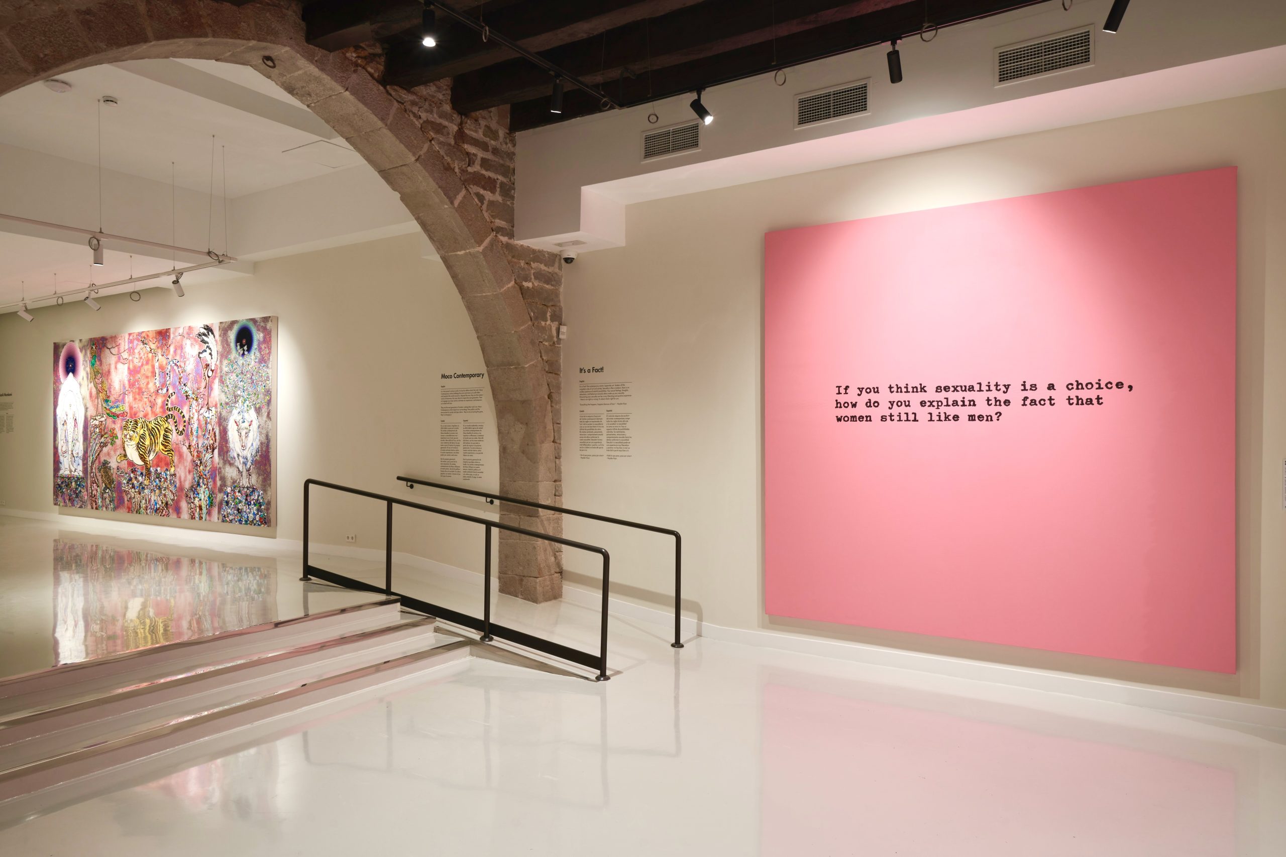 Pink text-based artwork by Hayden Kays displayed in Moco Museum gallery