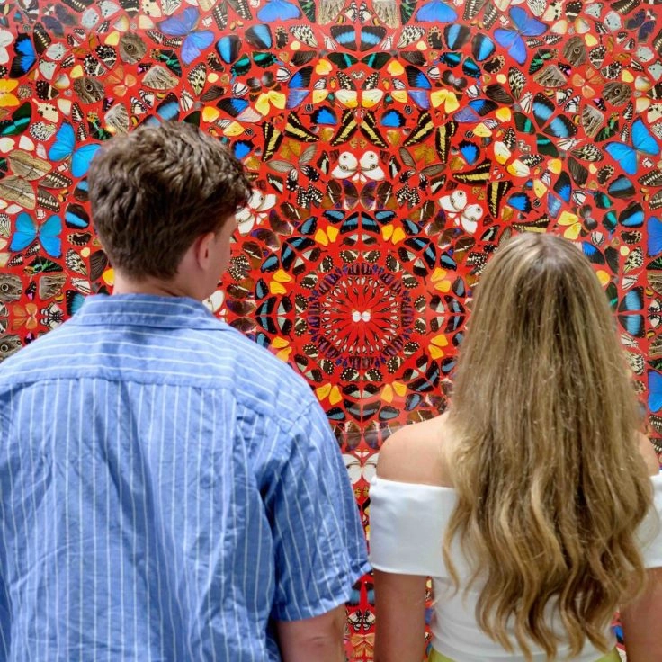 Butterfly wall installation by Hirst at Moco Museum London.